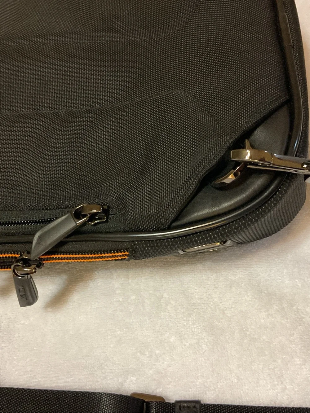 Tumi McLaren Black Sling Belt Bag with Orange Stripe